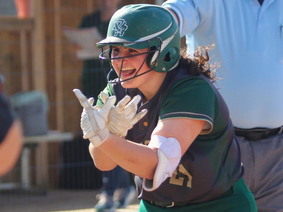 Dighton-Rehoboth's Haleigh Kelley celebrates hitting a home run during a South Coast Conference game against Case.