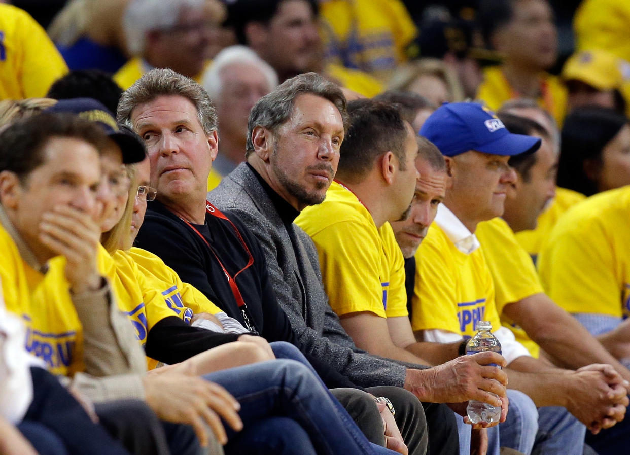 OAKLAND, CA - MAY 01:  Larry Ellison, the chief executive officer of Oracle Corporation, watches the Golden State Warriors play against the Los Angeles Clippers in Game Six of the Western Conference Quarterfinals during the 2014 NBA Playoffs at ORACLE Arena on May 1, 2014 in Oakland, California. 