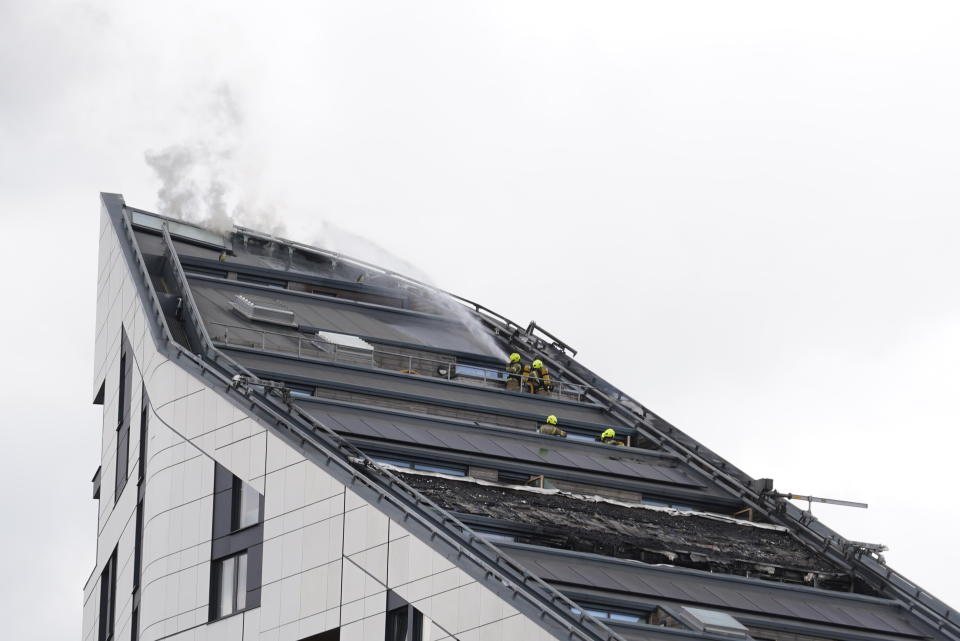 Firefighters tackling a blaze at a 17-storey block of flats in St Mark's Square in Bromley, south-east London. Picture date: Sunday July 3, 2022.
