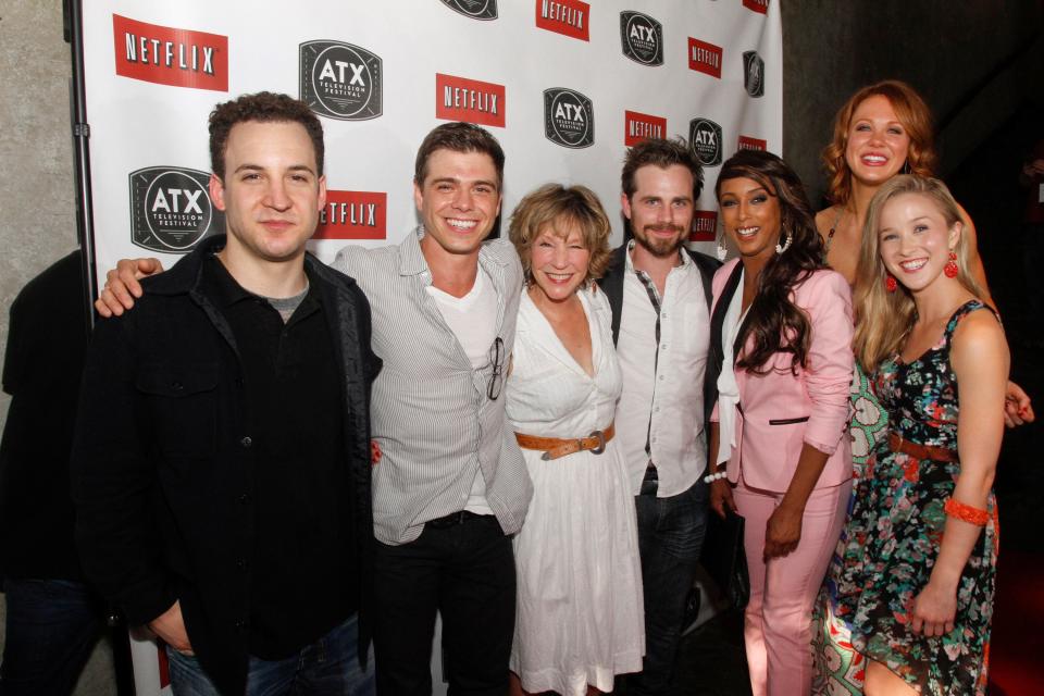 The cast of the the '90s ABC sitcom "Boy Meets World," including Ben Savage, Matthew Lawrence, Betsy Randle, Rider Strong, Trina McGee, Maitland Ward and Lily Gibson, left to right, attend the ATX Television Festival opening night red carpet on June 6, 2013.