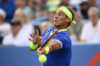 Rafael Nadal, of Spain, returns a shot to Jack Sock, of the United States, at the Citi Open tennis tournament Wednesday, Aug. 4, 2021, in Washington. (AP Photo/Nick Wass)