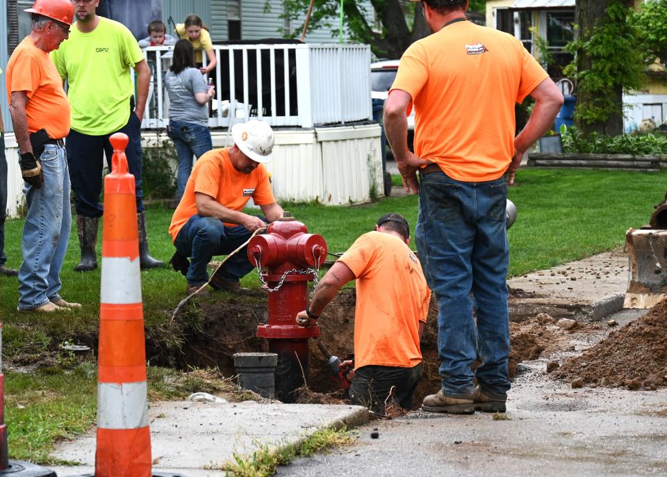 Crews from Parrish Construction replaced the broken hydrant in the Tallgrass mobile home community private water system Monday evening.