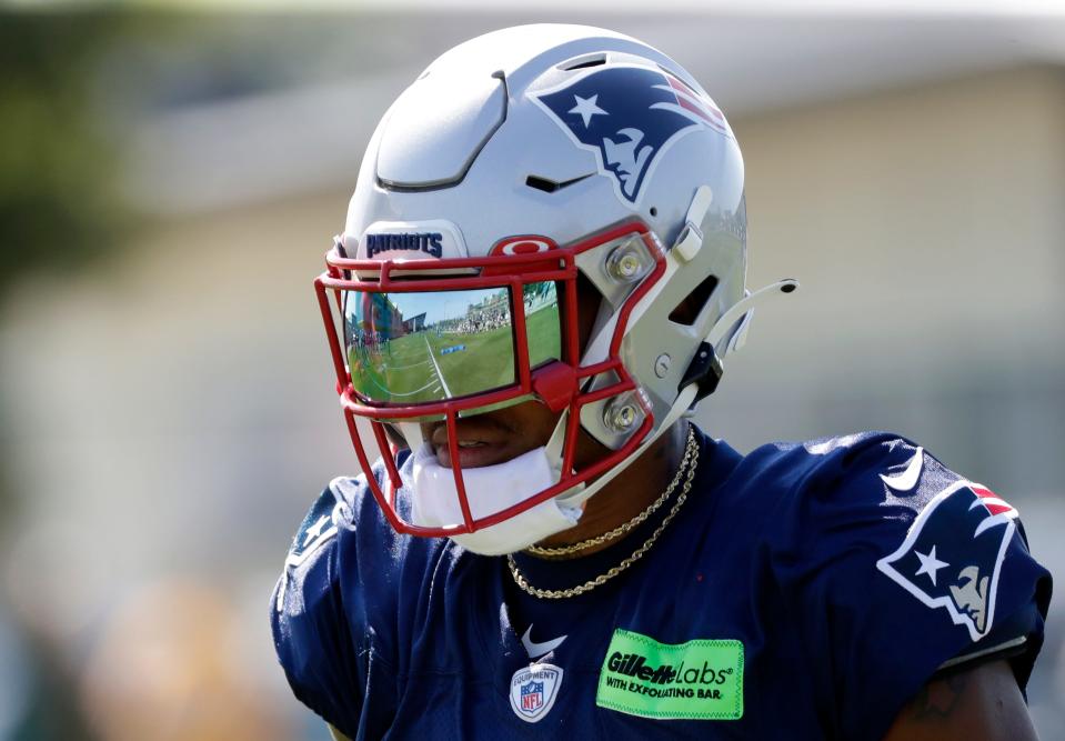 Clarke Hinkle Field reflected off the visor of New England Patriots wide receiver Kendrick Bourne (84) during a joint practice with the Green Bay Packers on Aug. 16, 2023, in Ashwaubenon, Wis.