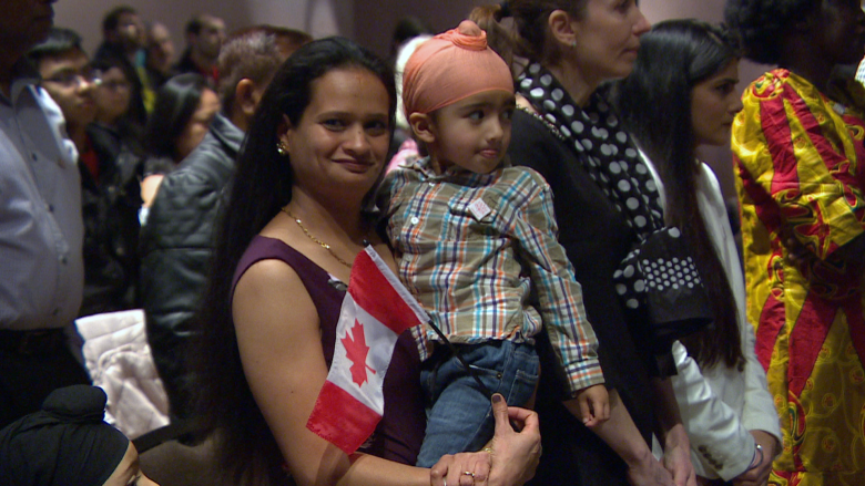 'The country opens up its heart': 48 new Canadians celebrate citizenship at human rights museum