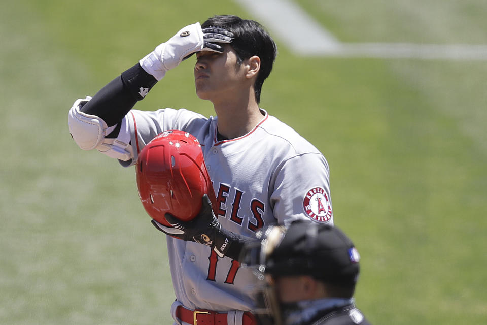 Los Angeles Angels' Shohei Ohtani reacts in the first inning of a baseball game against the Oakland Athletics, Monday, July 27, 2020, in Oakland, Calif. (AP Photo/Ben Margot)