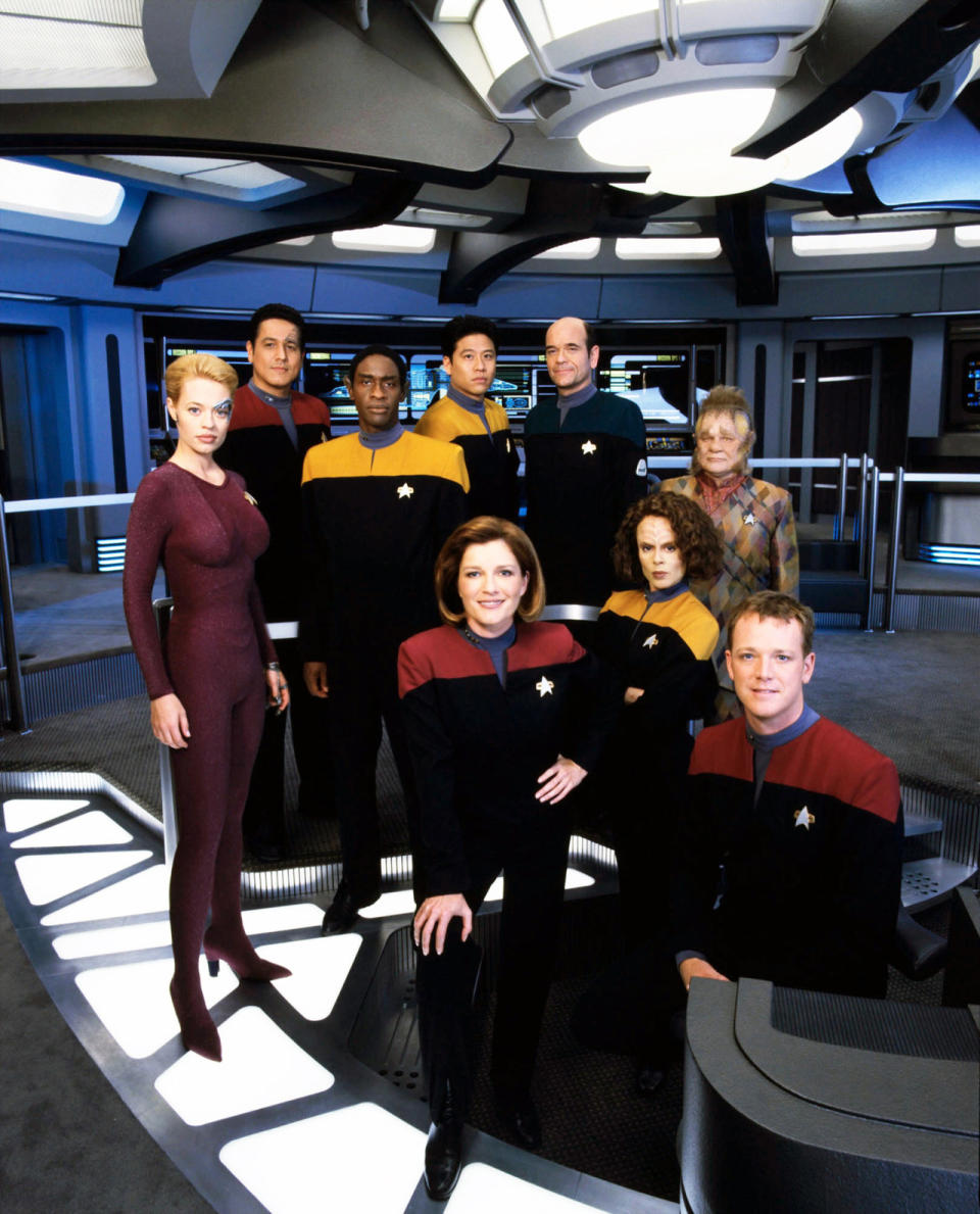 <p>Running concurrently with <em>Deep Space Nine</em> for much of its run meant that <em>Voyager</em> largely followed the look of that show, at least in regards to the uniformed officers. (Being on the other side of the galaxy also limited their exposure to new clothes.) The aliens, on the other hand, got to model more interesting clothes, from Neelix’s Talaxian duds to Seven of Nine’s form-fitting Borg-suit.<br><br>(Photo: Paramount/Courtesy Everett Collection) </p>