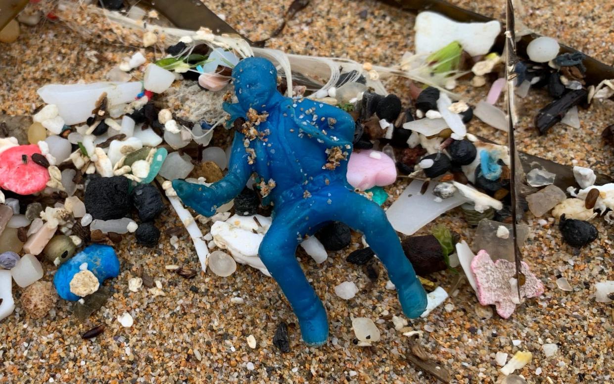 A blue cowboy from a 1957 box of Sugar Puffs was among the finds on the Cornish coast - Tracey Williams