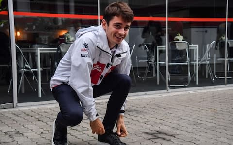 Sauber's Monaco's driver Charles Leclerc is seen at the Interlagos pits in Sao Paulo, Brazil on November 8, 2018, three days ahead of the Brazil Formula One Grand Prix - Credit: AFP