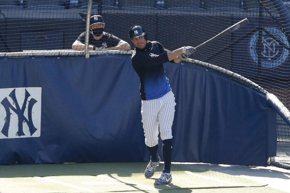 FILE - In this July 5, 2020, file photo, New York Yankees designated hitter Giancarlo Stanton bats during summer baseball training at Yankee Stadium in New York. Nothing changes the New York Yankees' mission, not the novel coronavirus, not a 60-game regular season. Winning the World Series is the sole focus. (AP Photo/Kathy Willens)