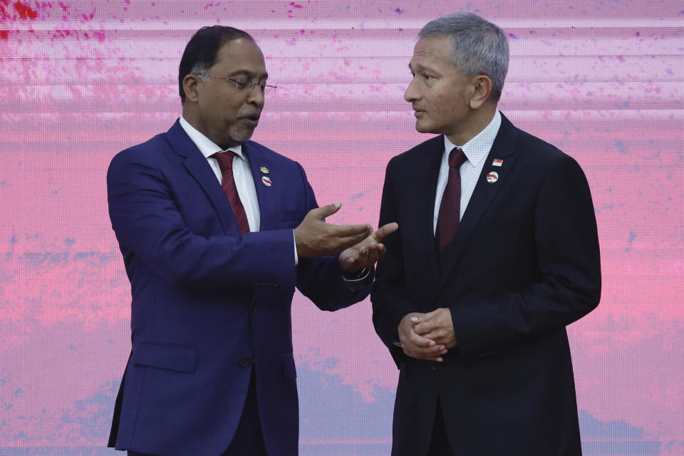 Malaysian Foreign Minister Zambry Abdul Kadir, left, talks with Singaporean Foreign Minister Vivian Balakrishnan during the 34th Association of Southeast Asian Nations (ASEAN) Coordinating Council (ACC) meeting, ahead of the ASEAN Summit, at the ASEAN Secretariat in Jakarta, Indonesia, Monday, Sept. 4, 2023. (Willy Kurniawan/Pool Photo via AP)