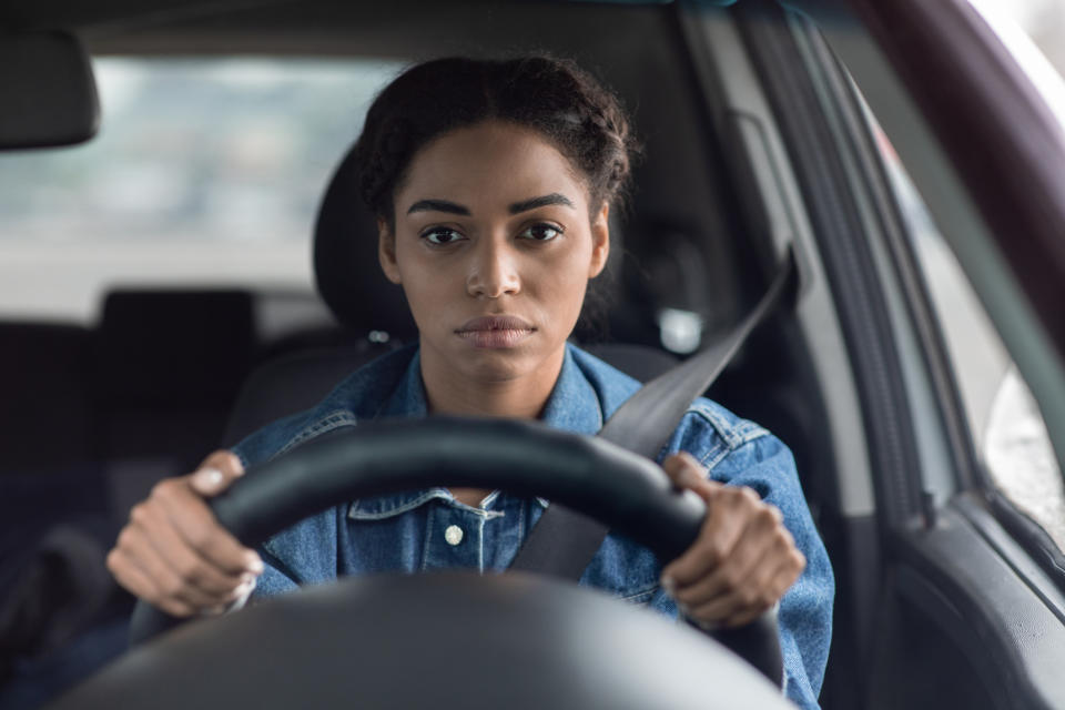 a woman driving a car