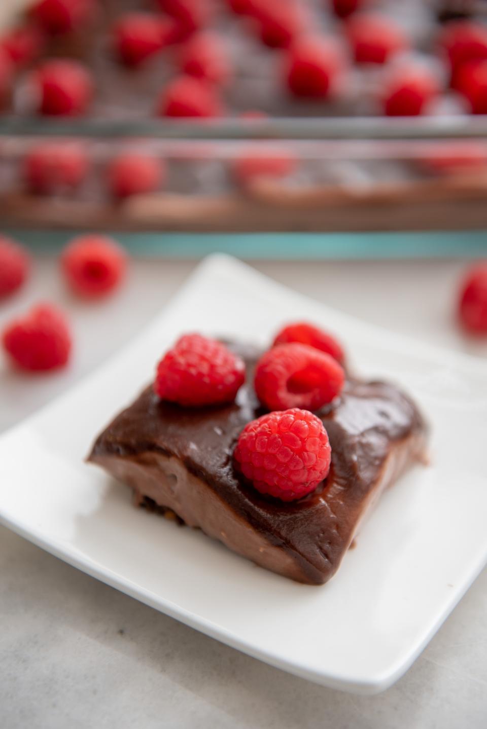 Chocolate pie topped with raspberries is low in fat and calories.