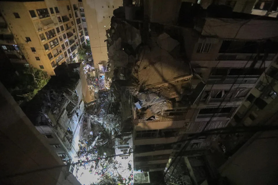 A photo taken on July 30 shows the destroyed top floors of an eight-story building following an Israeli military strike on Beirut's southern suburb.