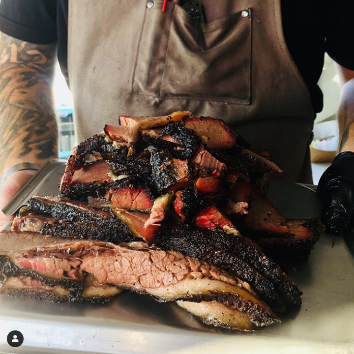 Pitmaster Ken Davis serves wood-smoked barbecue from his food track and catering business, Flyin' K BBQ.