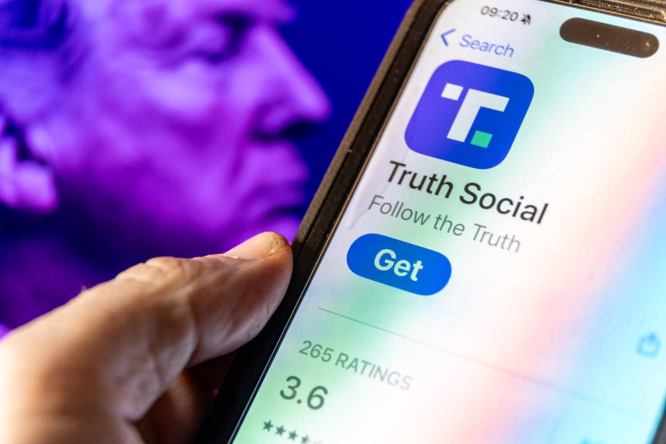 In this photo illustration, a smartphone screen displays the logo of Donald Trump's Truth Social app on March 25, 2024.  (Photo by Anna Barclay/Getty Images)
