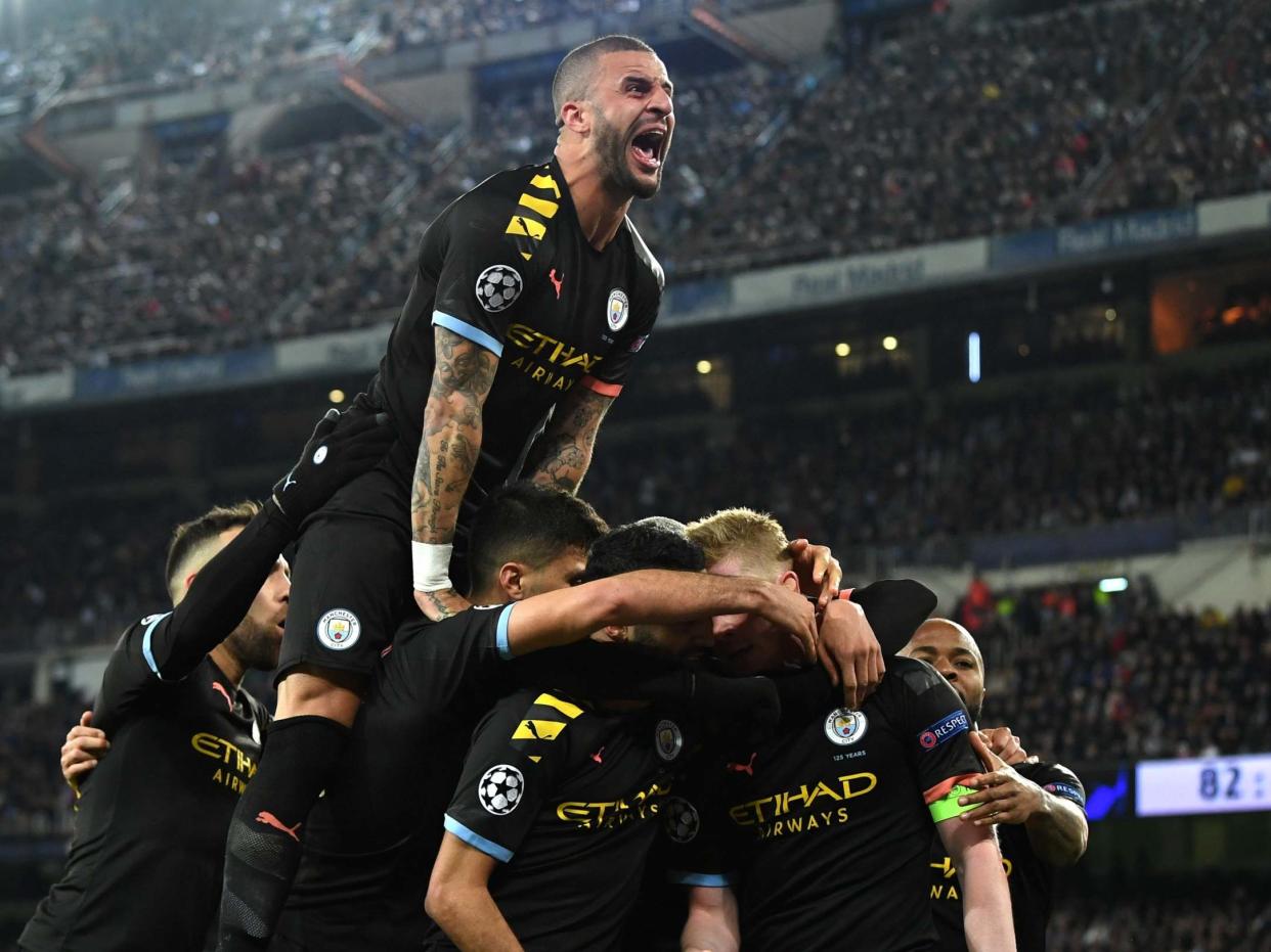 Manchester City celebrate after Kevin De Bruyne's penalty: Getty