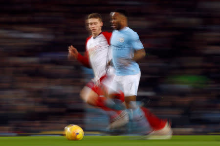 Soccer Football - Premier League - Manchester City vs West Bromwich Albion - Etihad Stadium, Manchester, Britain - January 31, 2018 Manchester City's Raheem Sterling in action with West Bromwich Albion's Sam Field Action Images via Reuters/Jason Cairnduff