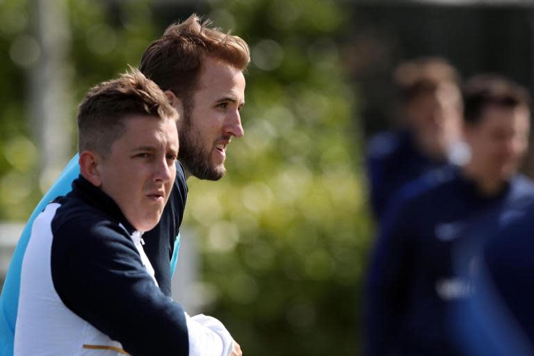 Injured Harry Kane watches on as England squad train at Tottenham