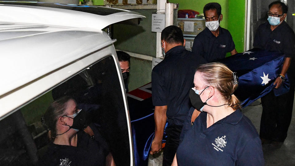 This photo shows the casket of Australian cricket player Shane Warne loaded into a vehicle at the Police General Hospital in Bangkok on Thursday. 