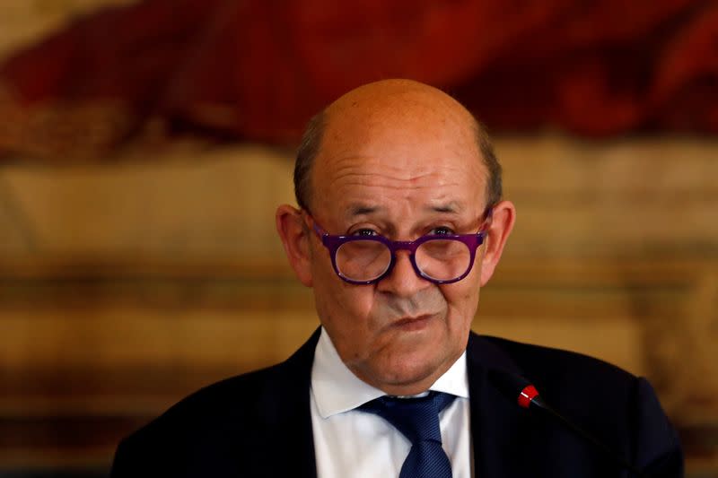 FILE PHOTO: Portugal's Foreign Minister Augusto Santos Silva meets with his French counterpart Jean-Yves Le Drian in Lisbon