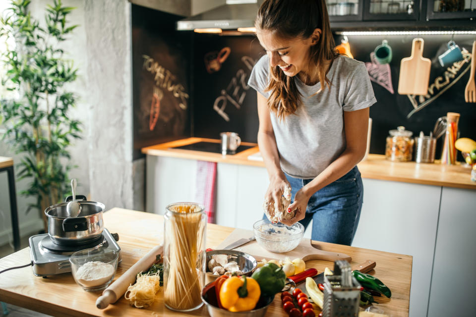 Woman prepping food. (Getty Images)