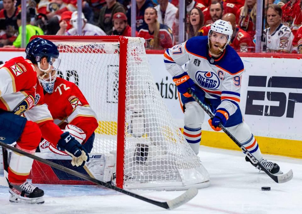 Edmonton Oilers center Connor McDavid (97) looks to pass behind the Panthers net during second period action in game 7