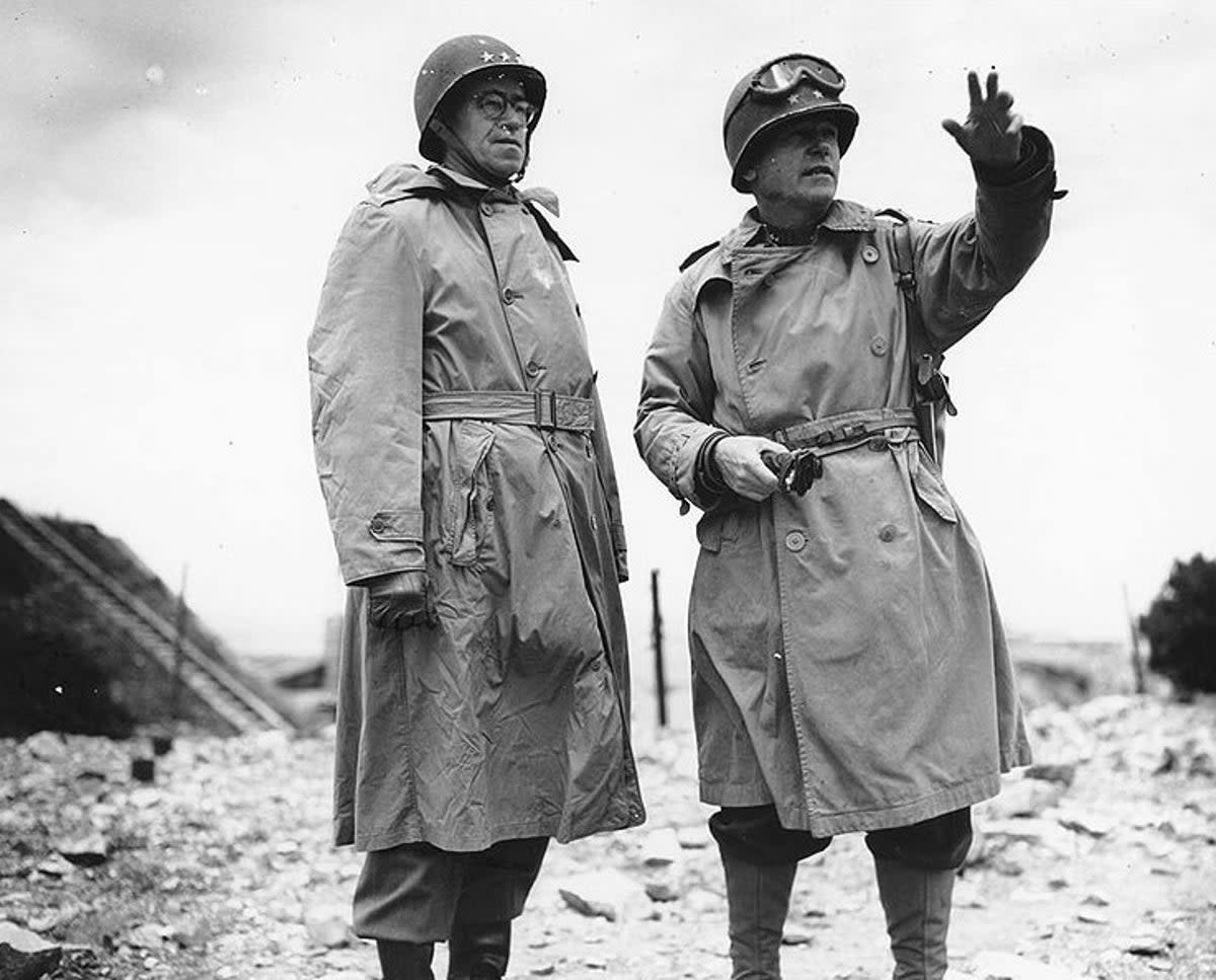 Top Operation Cobra commander, Major General J Lawton Collins (right) pictured speaking to Lieutenant General Omar Bradley (left) in Normandy in 1944 (Army Signal Corps/Naval Historical Center)