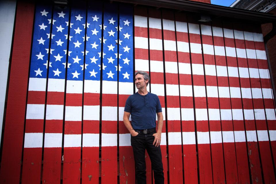 Mike Wolfe of American Pickers fame stands for a photo in LeClaire, where his store Antique Archaeology is located.