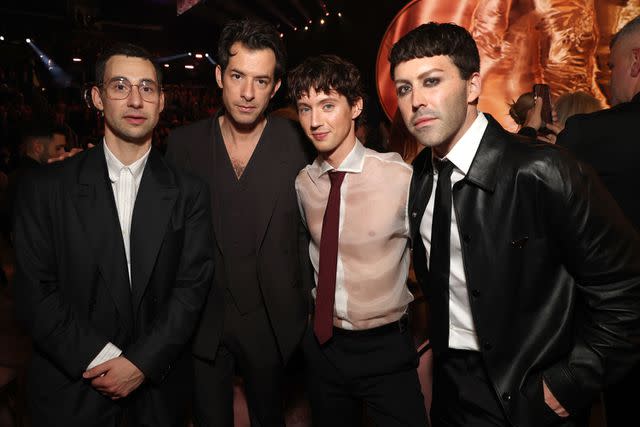 <p>Kevin Mazur/Getty</p> Jack Antonoff, Mark Ronson, Troye Sivan and Leland