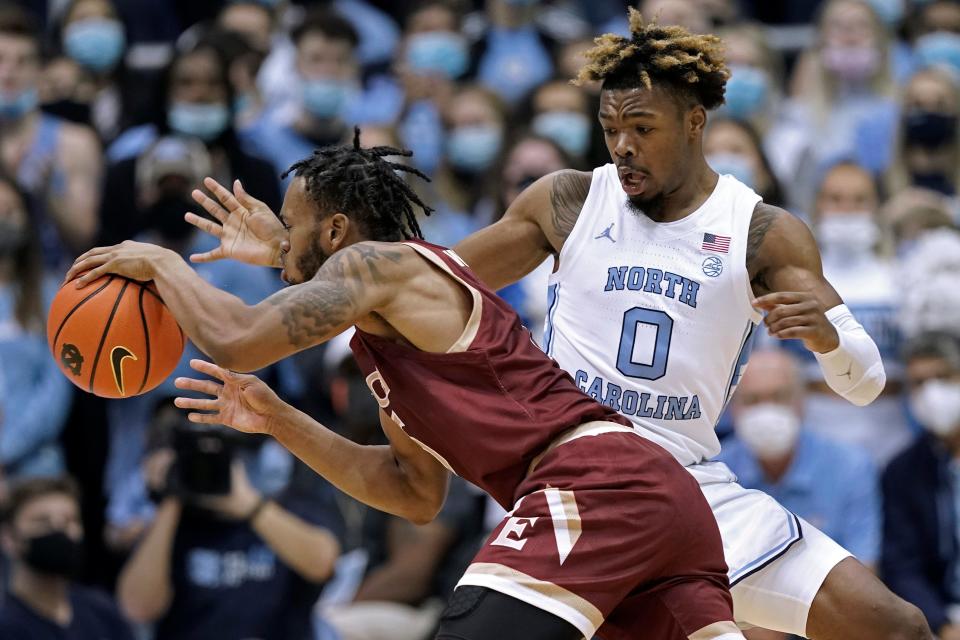 North Carolina guard Anthony Harris applies defensive pressure on Elon guard Torrence Watson during last month’s game in Chapel Hill.