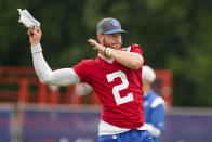 Indianapolis Colts quarterback Carson Wentz warms up during practice at the NFL team's football training camp in Westfield, Ind., Thursday, July 29, 2021. (AP Photo/Michael Conroy)