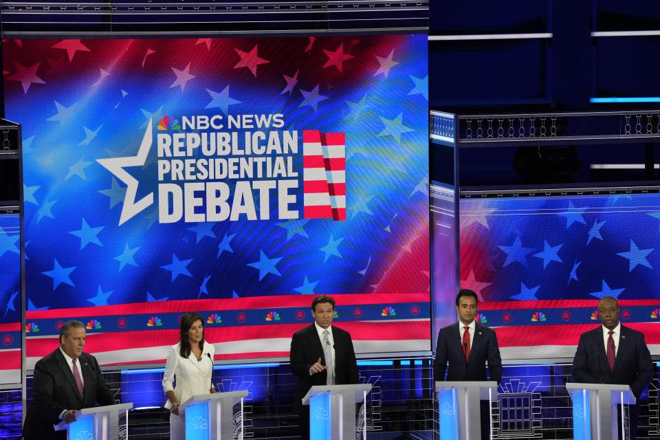 Republican presidential candidates from left, former New Jersey Gov. Chris Christie, former UN Ambassador Nikki Haley, Florida Gov. Ron DeSantis, businessman Vivek Ramaswamy and Sen. Tim Scott, R-S.C., participate in a Republican presidential primary debate hosted by NBC News Wednesday, Nov. 8, 2023, at the Adrienne Arsht Center for the Performing Arts of Miami-Dade County in Miami. (AP Photo/Rebecca Blackwell)