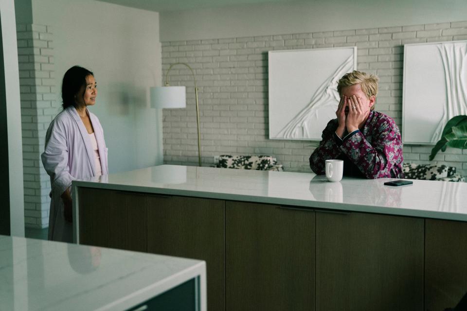 Hong Chau and Jesse Plemons play a married couple, pictured here in their home, in the first part of the film.