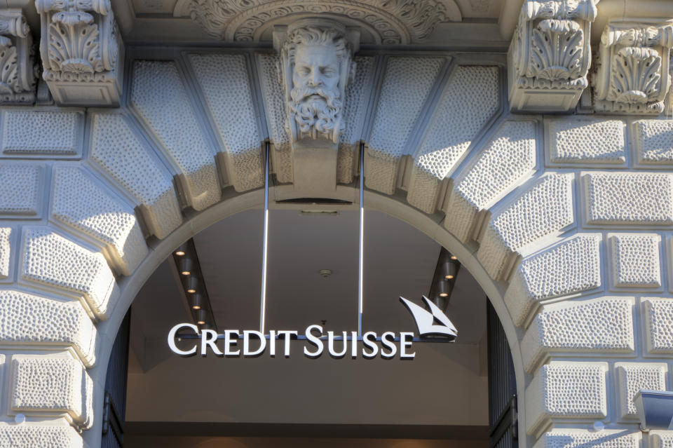 Zurich, Switzerland - May 18, 2011: The Credit Suisse logo hangs in the main entrance to the Credit Suisse building on the Paradeplatz in Zurich.
