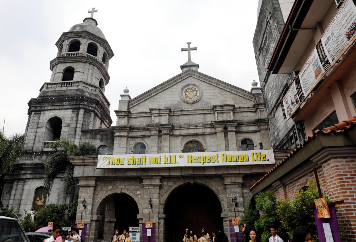 File Photo: A banner hangs outside a church in the Philippine town of Pateros, Metro Manila, Philippines March 15, 2017. REUTERS/Erik De Castro