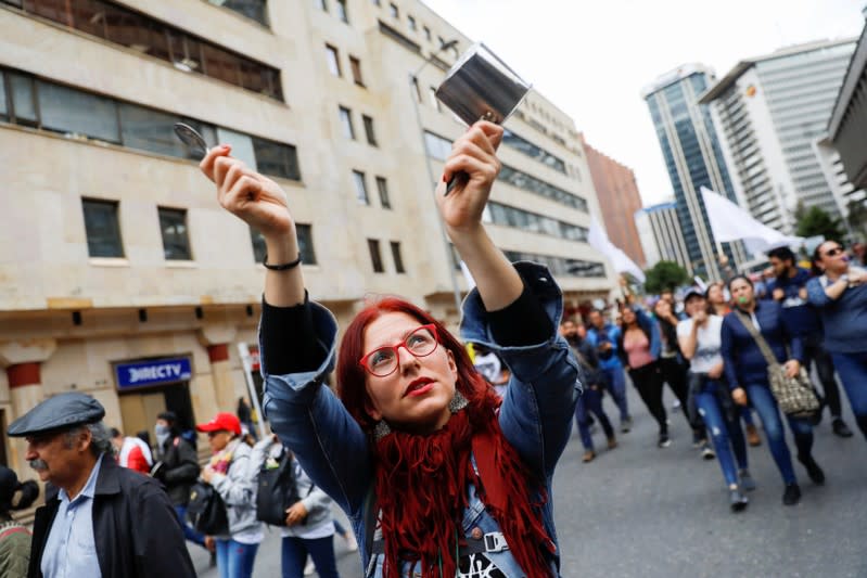 Demonstrators take part in a protest as a national strike continues in Bogota