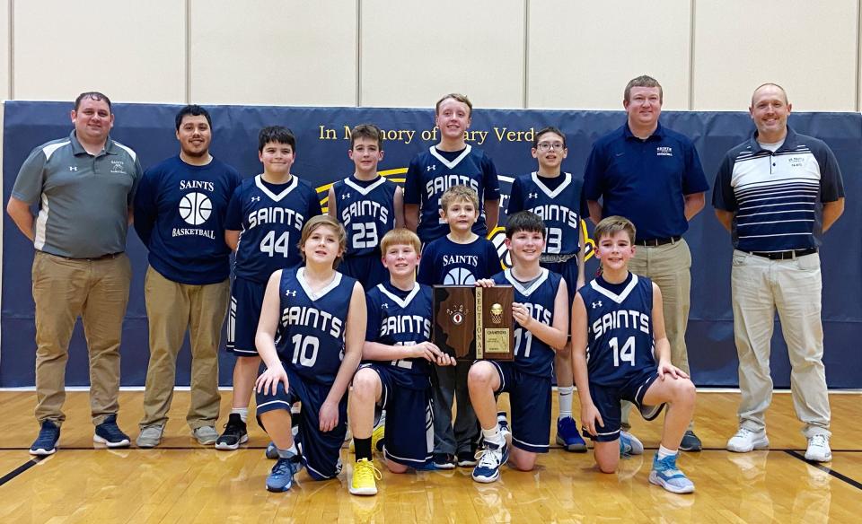 St. Mary's seventh grade Saints reached the Elite Eight in Class 1A boys' basketball. The Saints fell to Pana (Sacred Heart) Saturday in the quarterfinal round to end its season at 20-5. The Saints are, in front from left, Henry Yedinak, Zain Pierce, Adam Vitzthum and Graham Mennenga. In back are coach Matt Milhauser, coach Julio Carranza, Jack DeYoung, Sam Dewald, Aden Brummel, Chris Gray, coach Adam Lawrence and coach Matt Brummel.