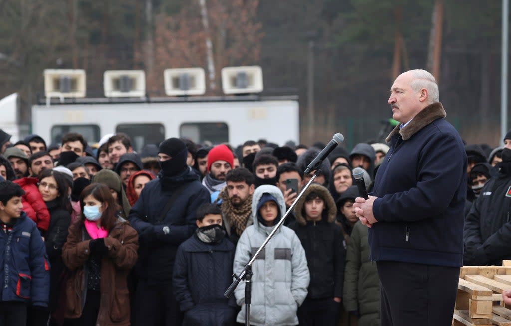 Belarusian President Alexander Lukashenko speaks to migrants at the country’s border with Poland (AP)