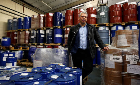 Julian Sarkar, director of Zanos ltd, poses for a picture at his warehouse in Liverpool, Britain February 22, 2018. Picture taken February 22, 2018. REUTERS/Andrew Yates