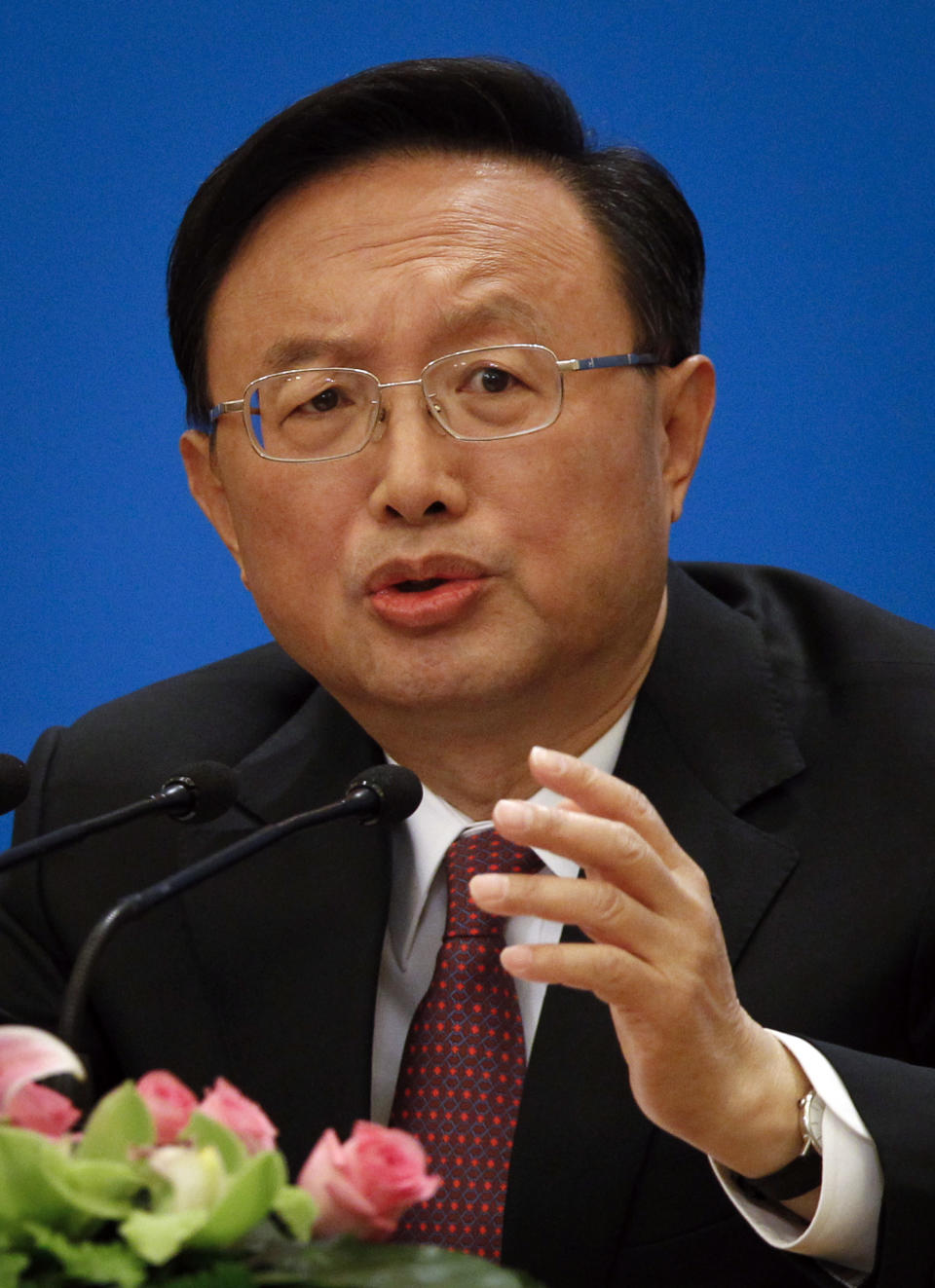 Foreign Minister Yang Jiechi gestures during a press conference at the Great Hall of the People in Beijing, China, Tuesday, March 6, 2012. Yang said Tuesday that Beijing and Washington need to build more trust, though he suggested the onus is on the U.S. to respect Chinese interests on issues such as Taiwan and Tibet. (AP Photo/ Vincent Thian)