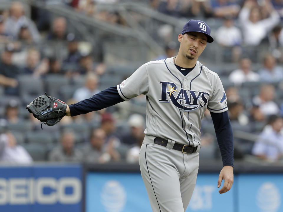 Tampa Bay Rays starting pitcher Blake Snell reacts after walking a batter during the first inning of a baseball game against the New York Yankees at Yankee Stadium, Wednesday, June 19, 2019, in New York. (AP Photo/Seth Wenig)