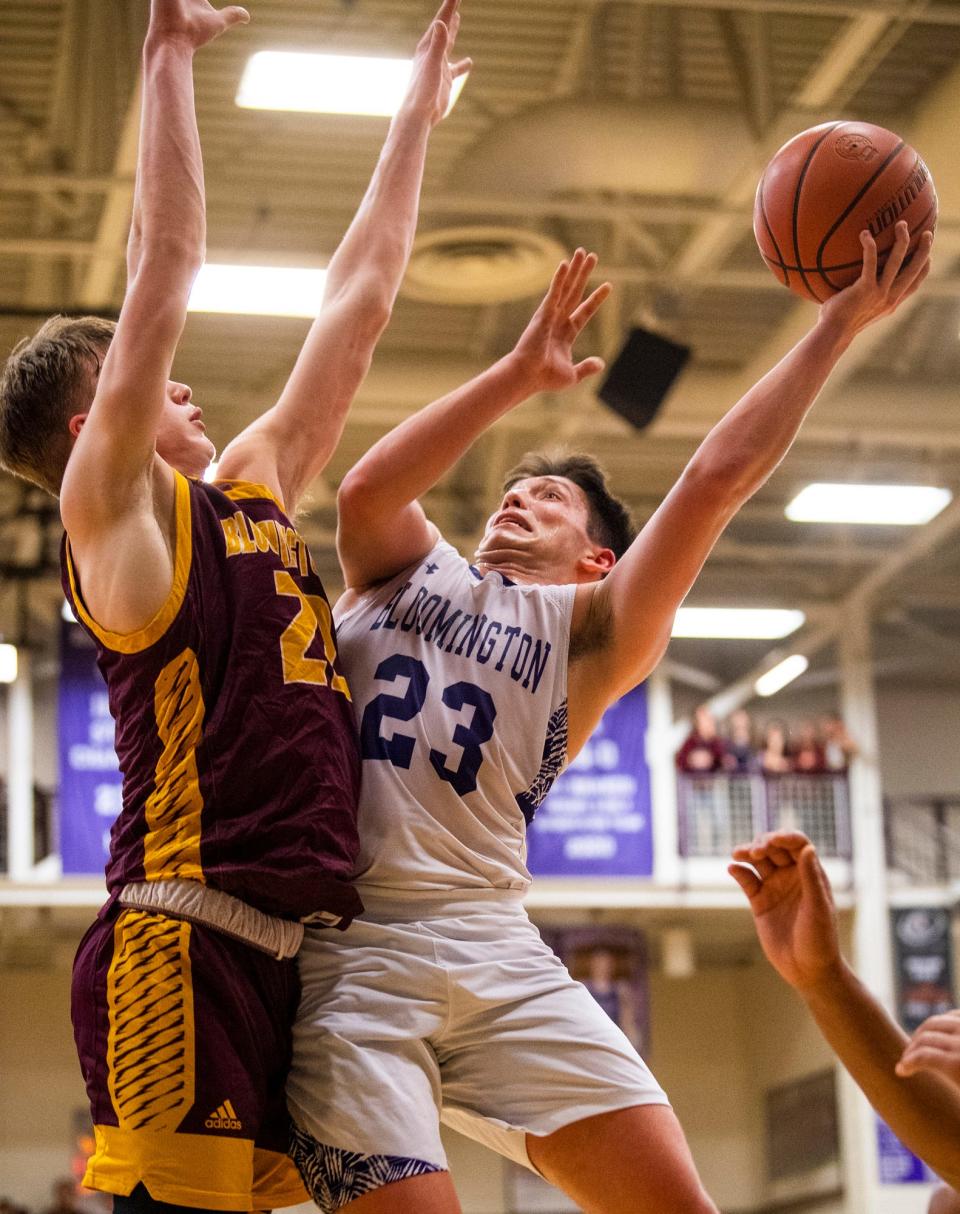 South's Taye Spears (23) shoots over North's Luke Lindeman (22) during the Bloomington North versus Bloomington South boys basketball game at Bloomington High School South on Friday, Jan. 6, 2023.