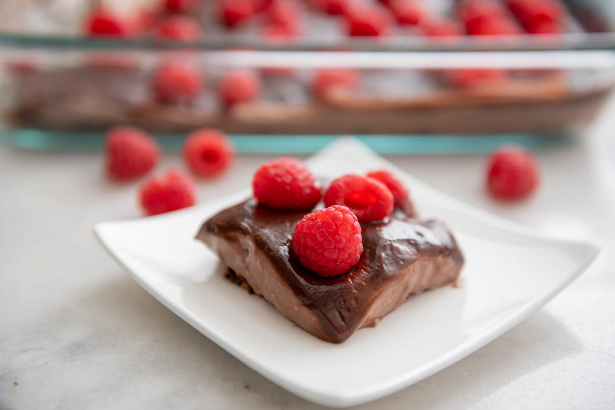 Chocolate pie topped with raspberries is low in fat and calories.