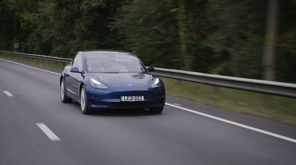 tesla model 3 on the motorway