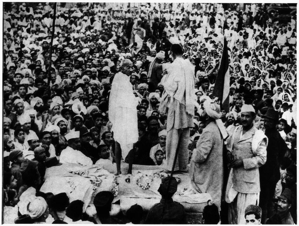 Mahatma Gandhi speaking to the crowd on a makeshift stage druing a rally. Peshawar, July 1938 (Photo by Mondadori via Getty Images)