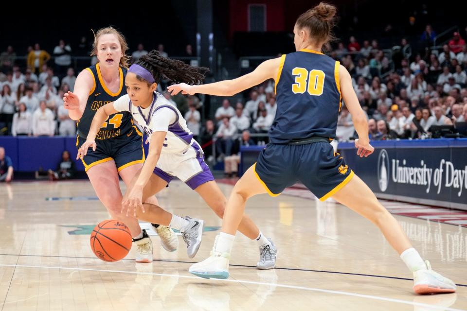 Mar 10, 2023; Dayton, Ohio, United States; Pickerington Central's Rylee Bess (2) dribbles between Olmsted Falls' Maddie Cerovac (24) and Emily Scina (30) during the second half of the OHSAA Division I girls basketball state semifinal game between Pickerington Central and Olmsted Falls at University of Dayton Arena. Mandatory Credit: Joseph Scheller-The Columbus Dispatch