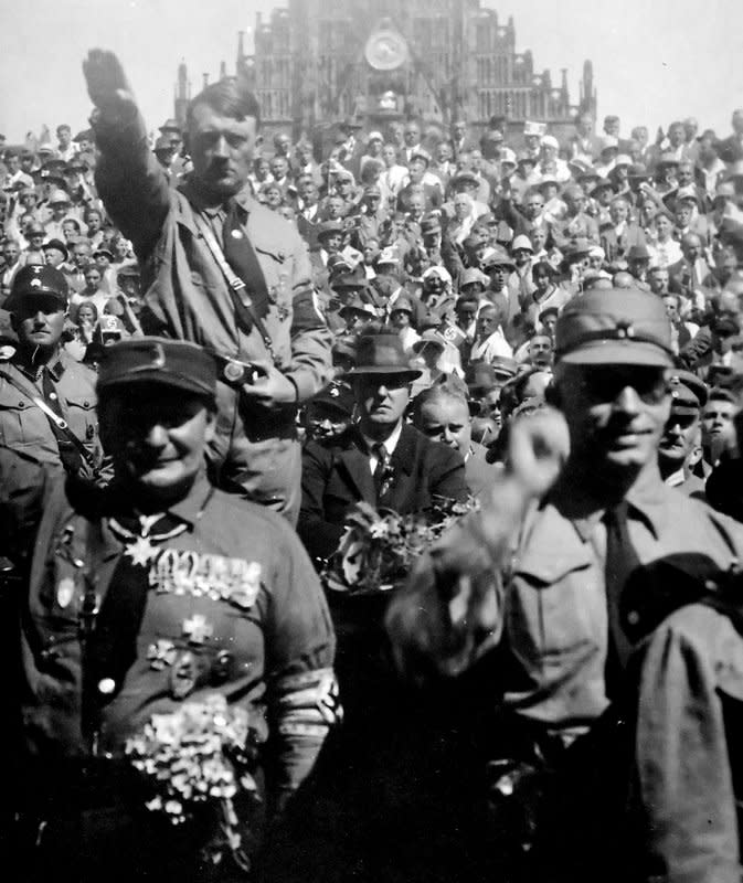 Adolf Hitler attends a Nazi party rally in Nuremberg, Germany, circa 1928. On April 30, In 1945, Hitler's burned body was found in a bunker in the ruins of Berlin. File Photo courtesy of the NARA