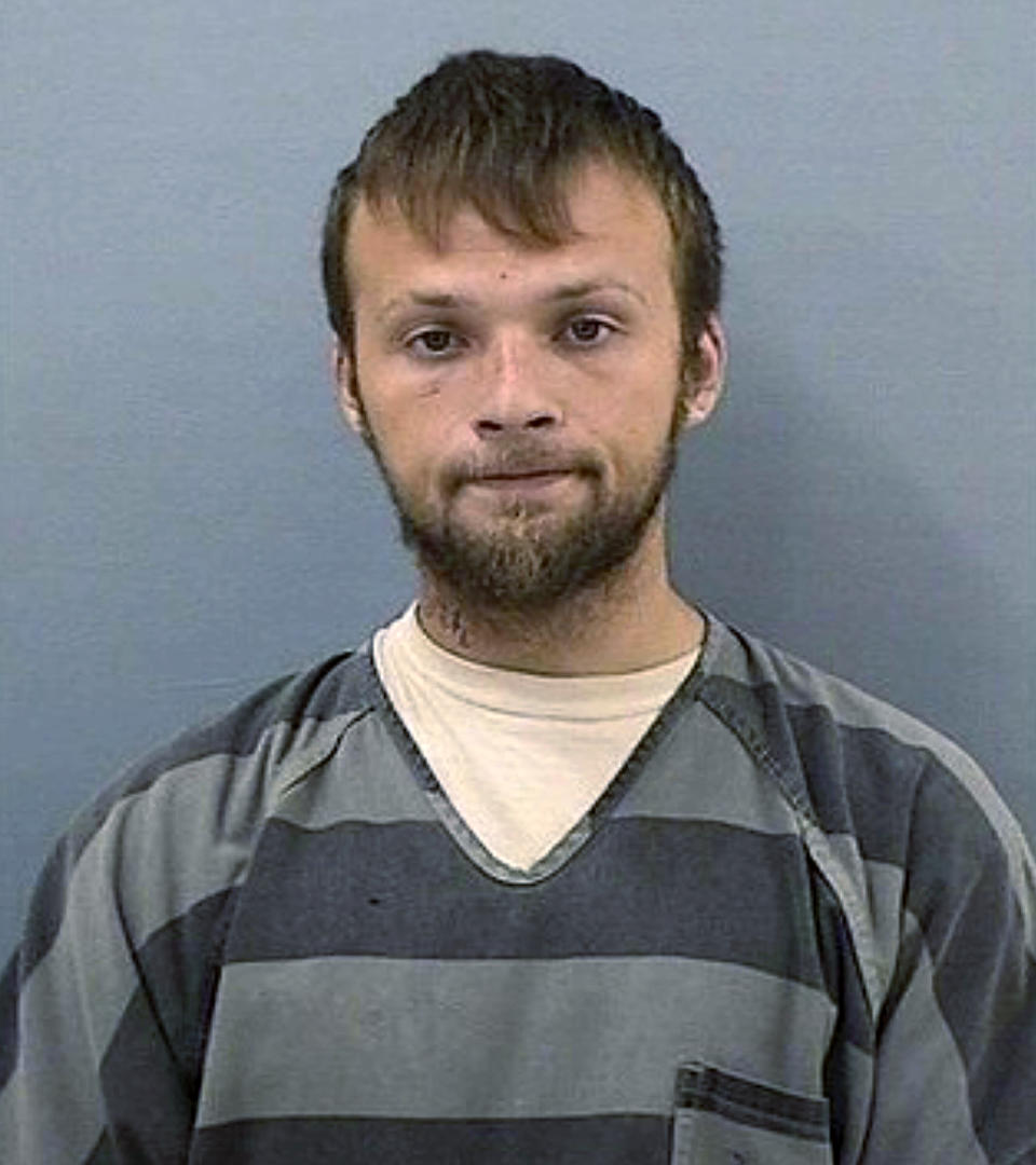 FILE - This undated booking file photo provided by the Tennessee Bureau of Investigation shows Michael Cummins. The Tennessee man who killed eight people in rural Westmoreland over several days in April 2019, has pleaded guilty to eight counts of first-degree murder in exchange for a sentence of life without parole. Cummins admitted to the murders in court Wednesday, Aug. 16, 2023. The victims included his parents, his uncle and a 12-year-old girl. (Tennessee Bureau of Investigation via AP, File)