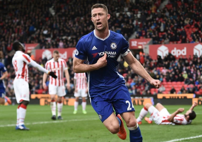 Chelsea's Gary Cahill (C) celebrates after scoring a goal during their English Premier League match against Stoke City, at the Bet365 Stadium in Stoke-on-Trent, on March 18, 2017