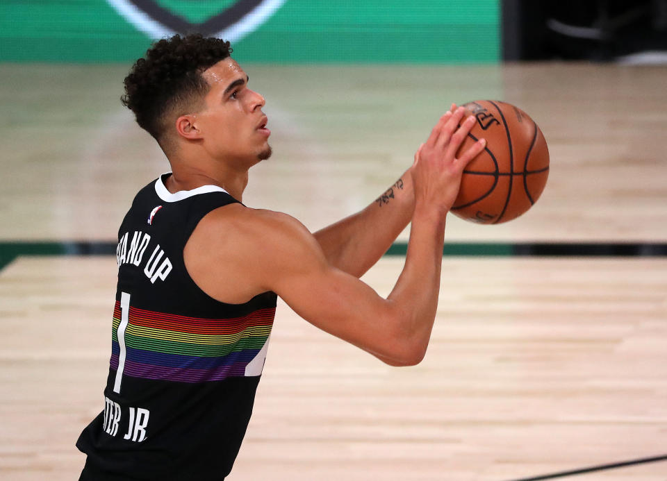 LAKE BUENA VISTA, FLORIDA - SEPTEMBER 01: Michael Porter Jr. #1 of the Denver Nuggets shoots the ball against the Utah Jazz in Game Seven of the Western Conference First Round during the 2020 NBA Playoffs at AdventHealth Arena at ESPN Wide World Of Sports Complex on September 01, 2020 in Lake Buena Vista, Florida. NOTE TO USER: User expressly acknowledges and agrees that, by downloading and or using this photograph, User is consenting to the terms and conditions of the Getty Images License Agreement.  (Photo by Mike Ehrmann/Getty Images)